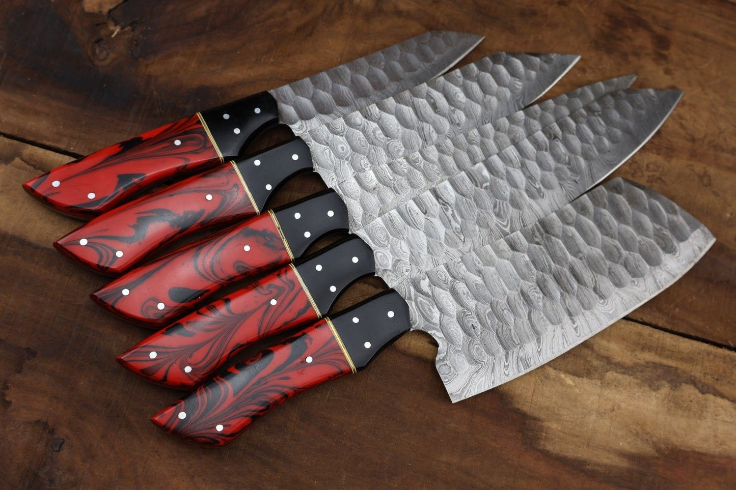 Hand forged 5 pc Damascus steel knife set with premium resin handles, suitable for professional kitchen use, camping, and hunting.