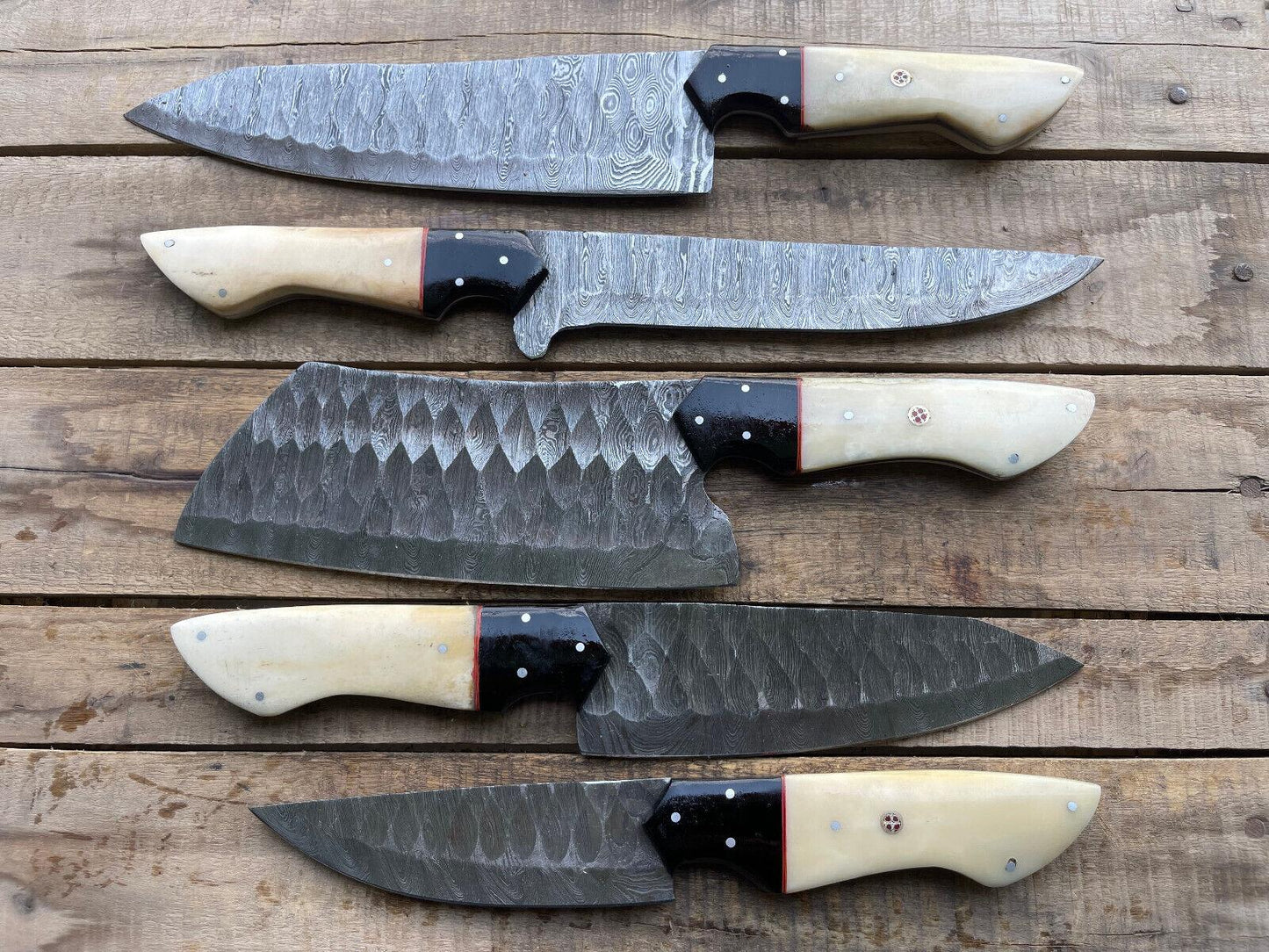 Detail shot of a custom ergonomic knife handle crafted from premium materials for a professional chef knife set.