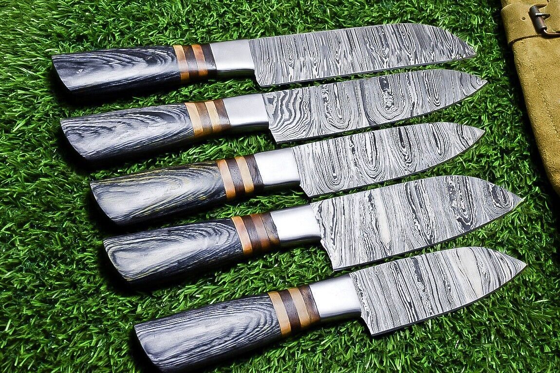 5 pc custom Damascus kitchen knife set with hand forged 384 layer steel blades and hardwood handles with steel bolsters.
