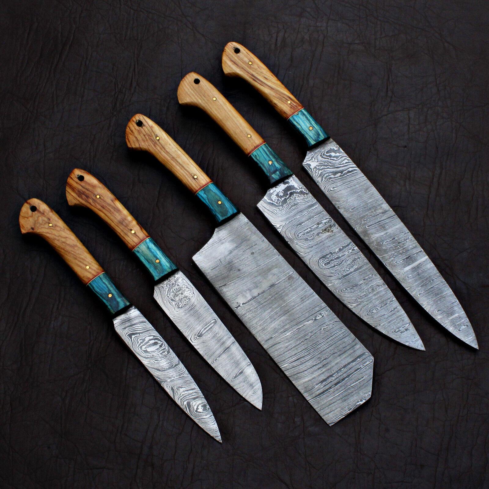 5pc custom handmade Damascus chef knife set with forged steel blades on a rustic wooden background.