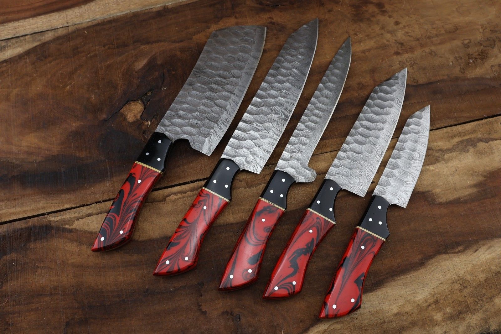 Hand forged 5 pc Damascus steel knife set with premium resin handles, suitable for professional kitchen use, camping, and hunting.