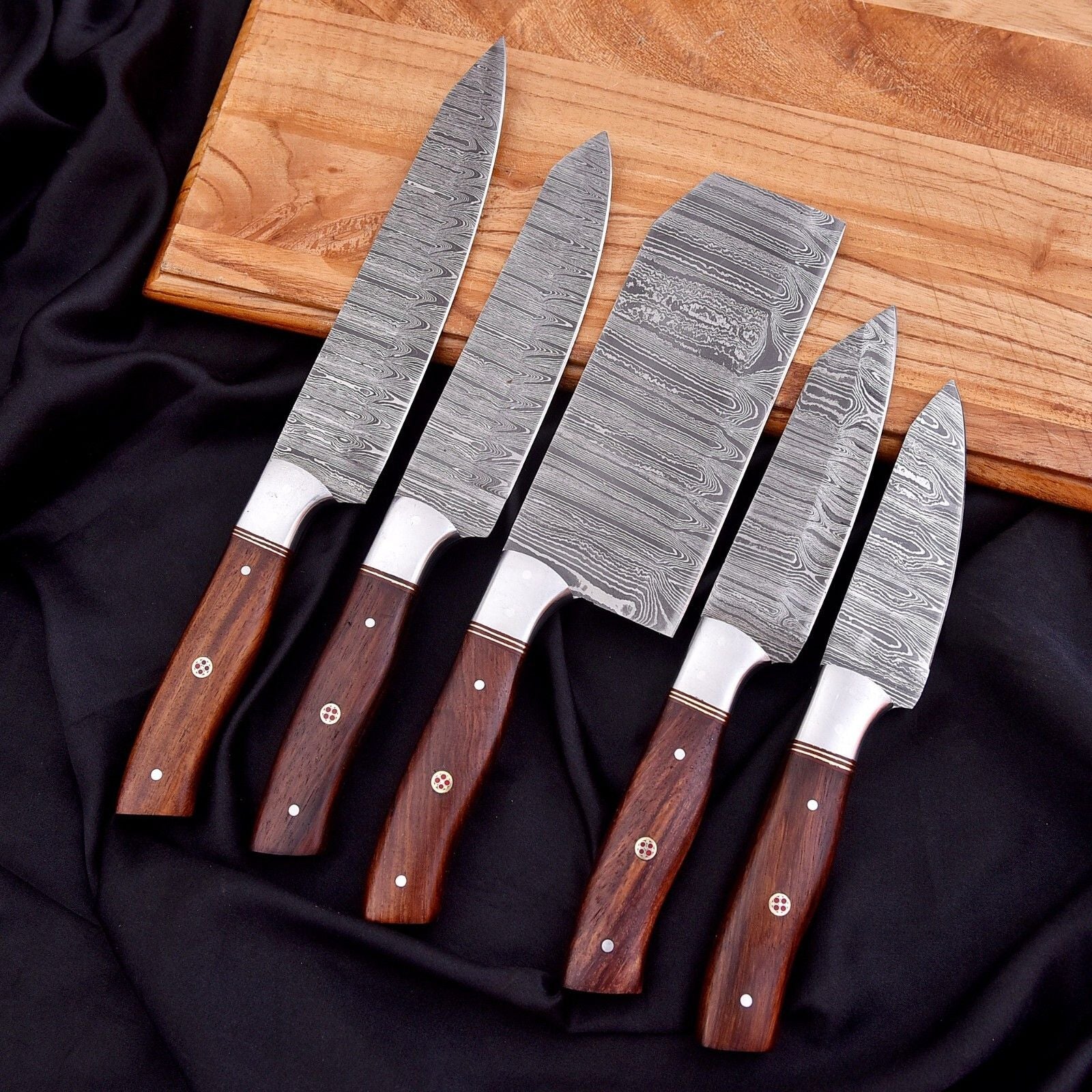 Professional 5 pc hand forged Damascus steel chef knife set featuring 512 layer twist pattern blades.