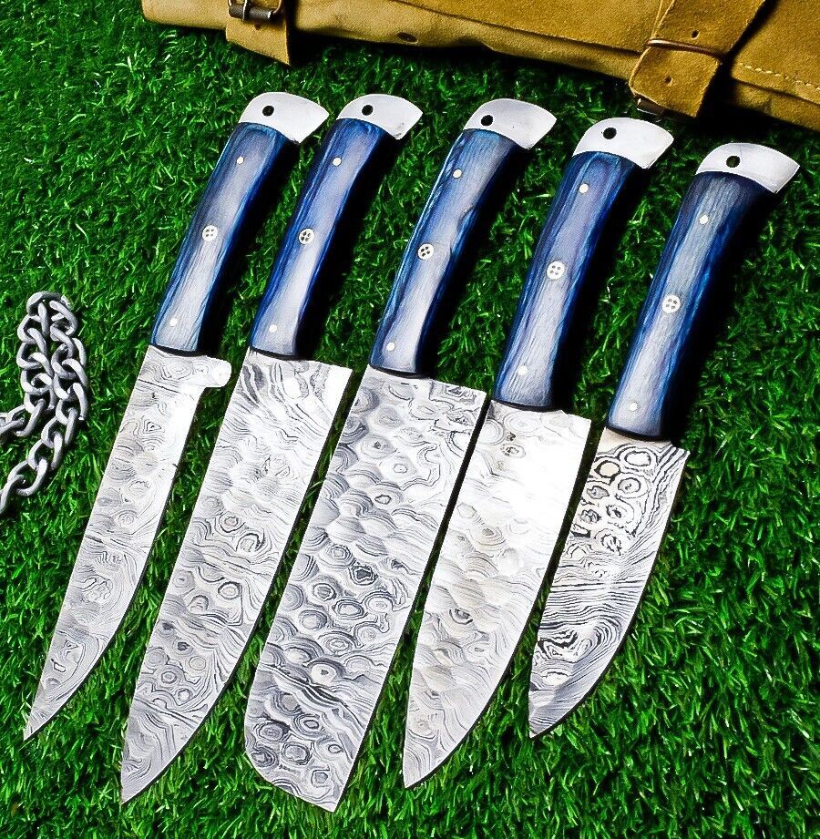 5 pc Damascus steel chef knife set displayed next to a measurement scale for size reference.