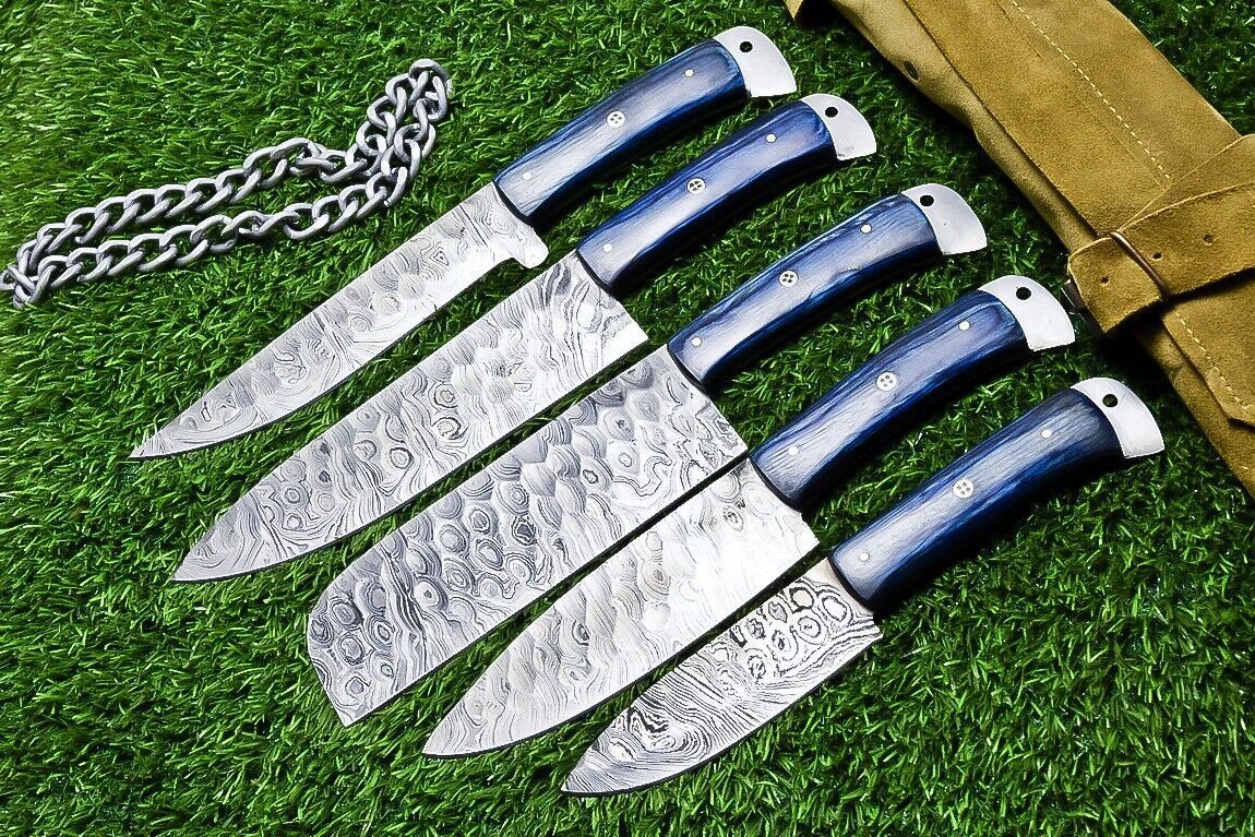 5 pc Damascus steel chef knife set displayed next to a measurement scale for size reference.
