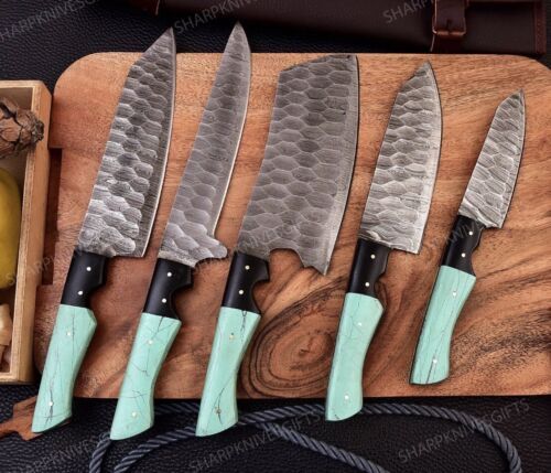 Handmade 5 piece Damascus steel kitchen knife set with full tang design and classic resin handles.