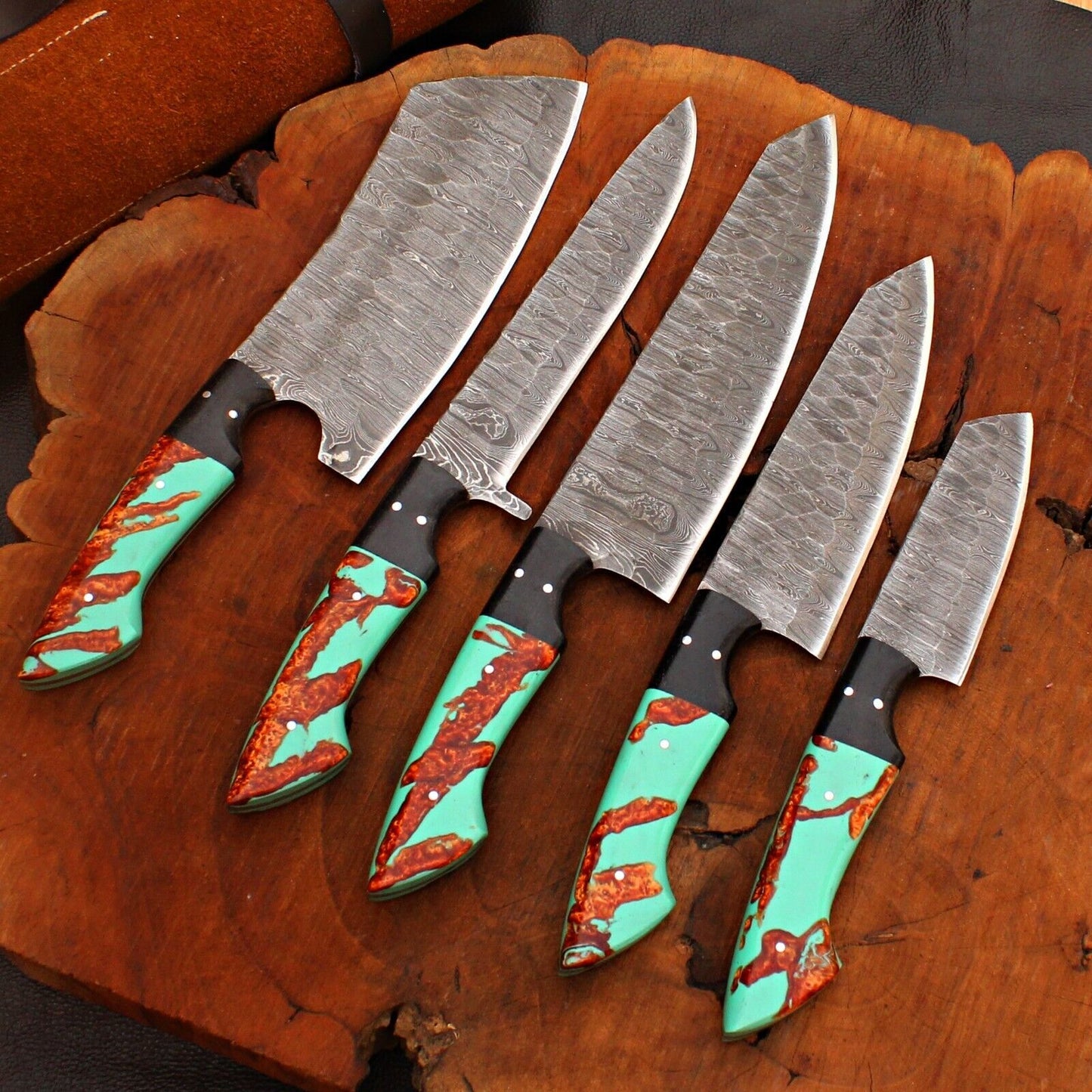 5pc custom handmade Damascus chef knife set with leather sheaths, featuring forged steel blades and unique ergonomic handles.
