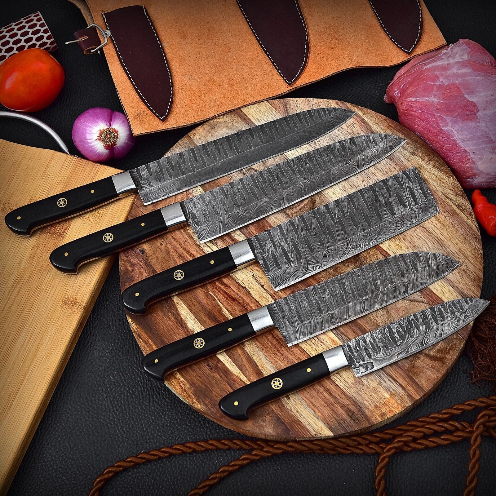 Hand forged 5 pc Damascus steel chef knife set including Paring, Bread, Utility, Chef, and Cleaver knives with leather sheaths.