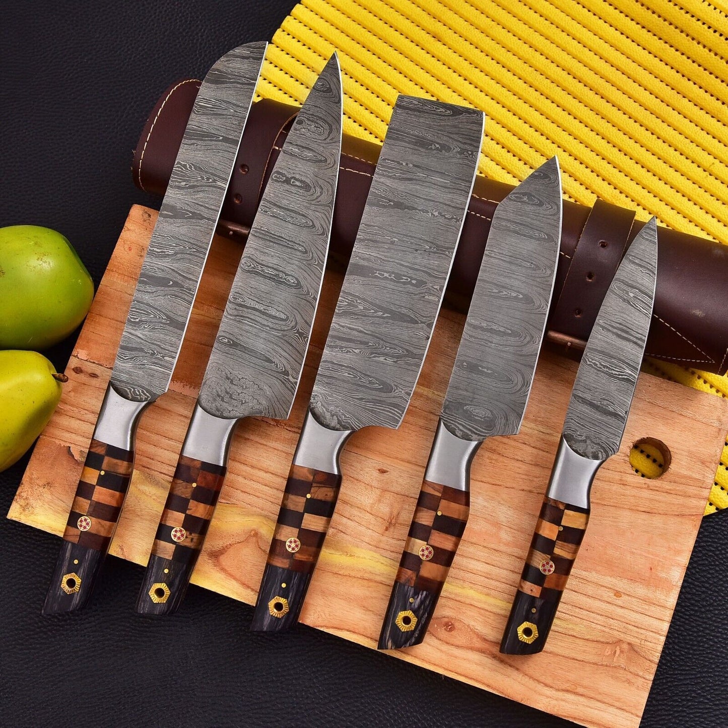 Hand forged 5 pc Damascus steel chef knife set with ergonomic wood handles, complete with custom leather sheaths.