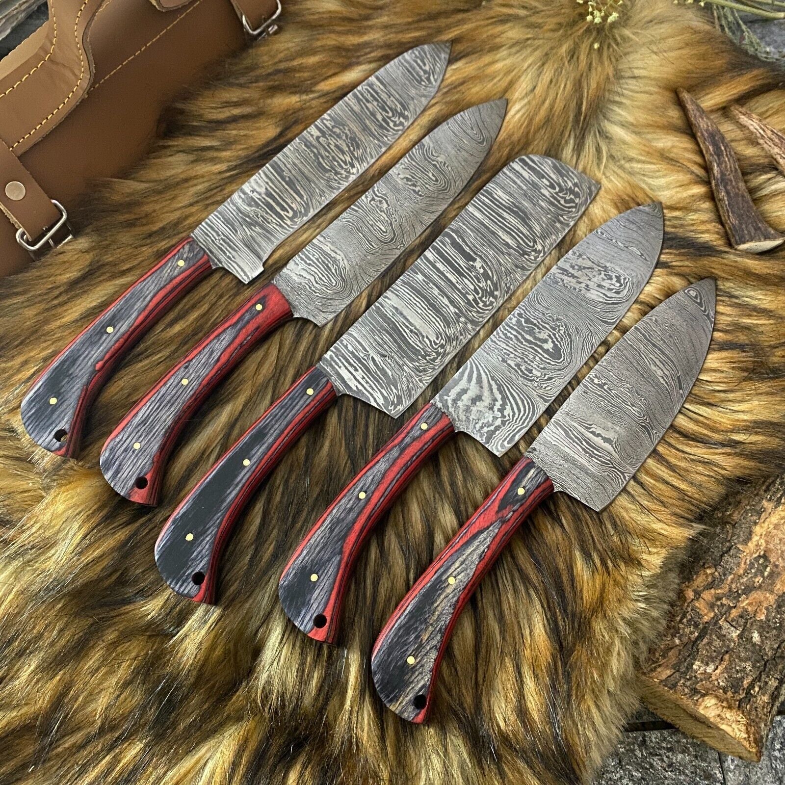 Hand forged 5 piece custom kitchen knife set with sleek black coated steel blades and wood handles.