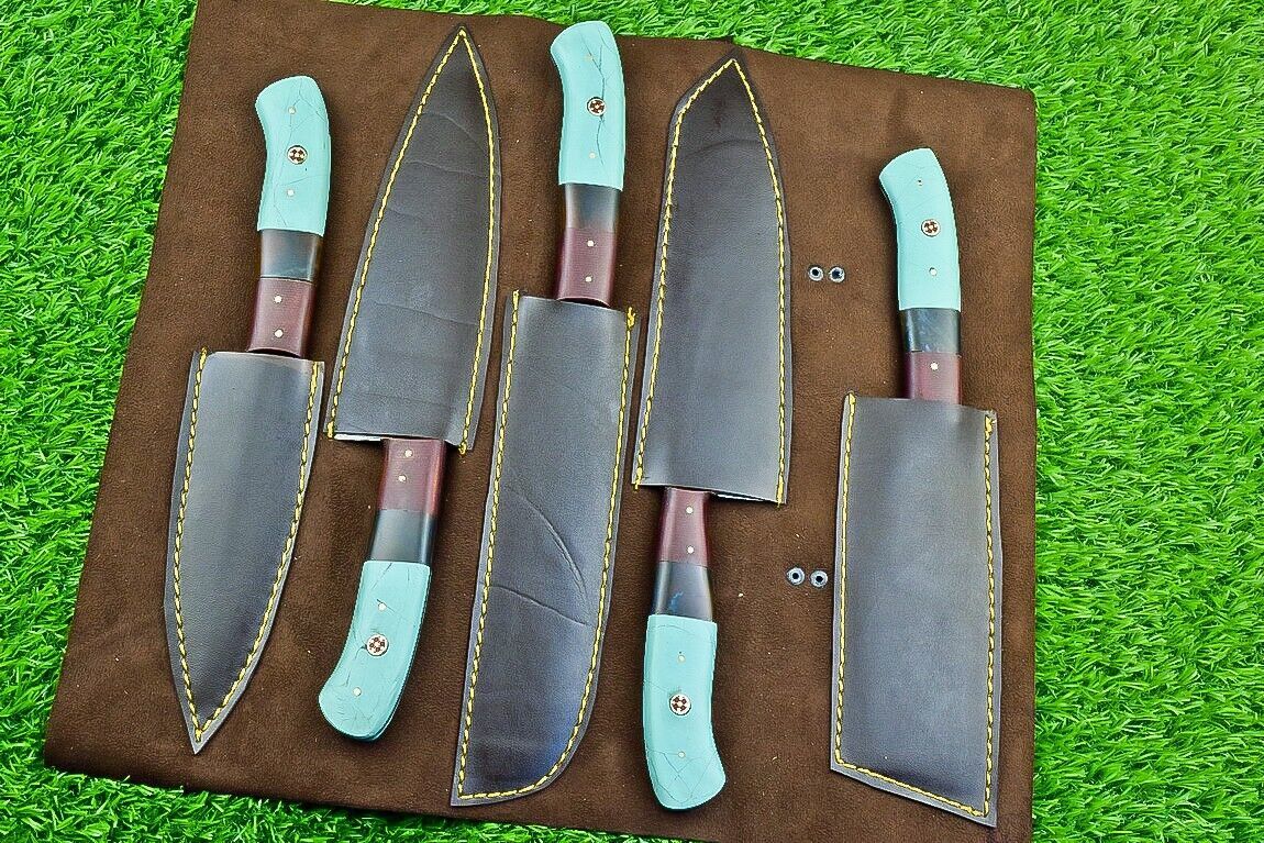 A complete 5 pc set of Damascus kitchen knives with resin and micarta handles, showcased with their leather storage roll.