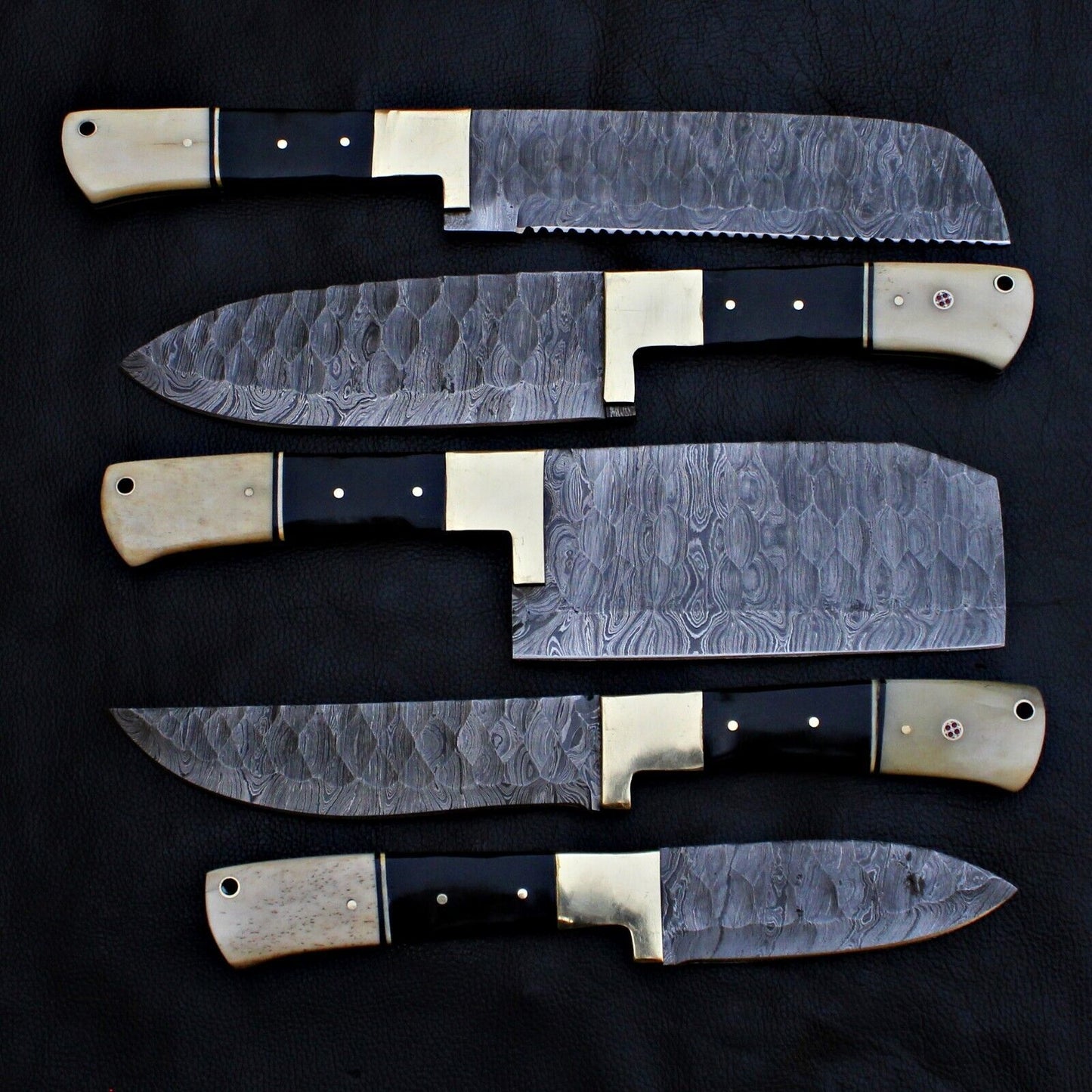 Top down layout of the 5 pc professional Damascus steel chef knife collection.
