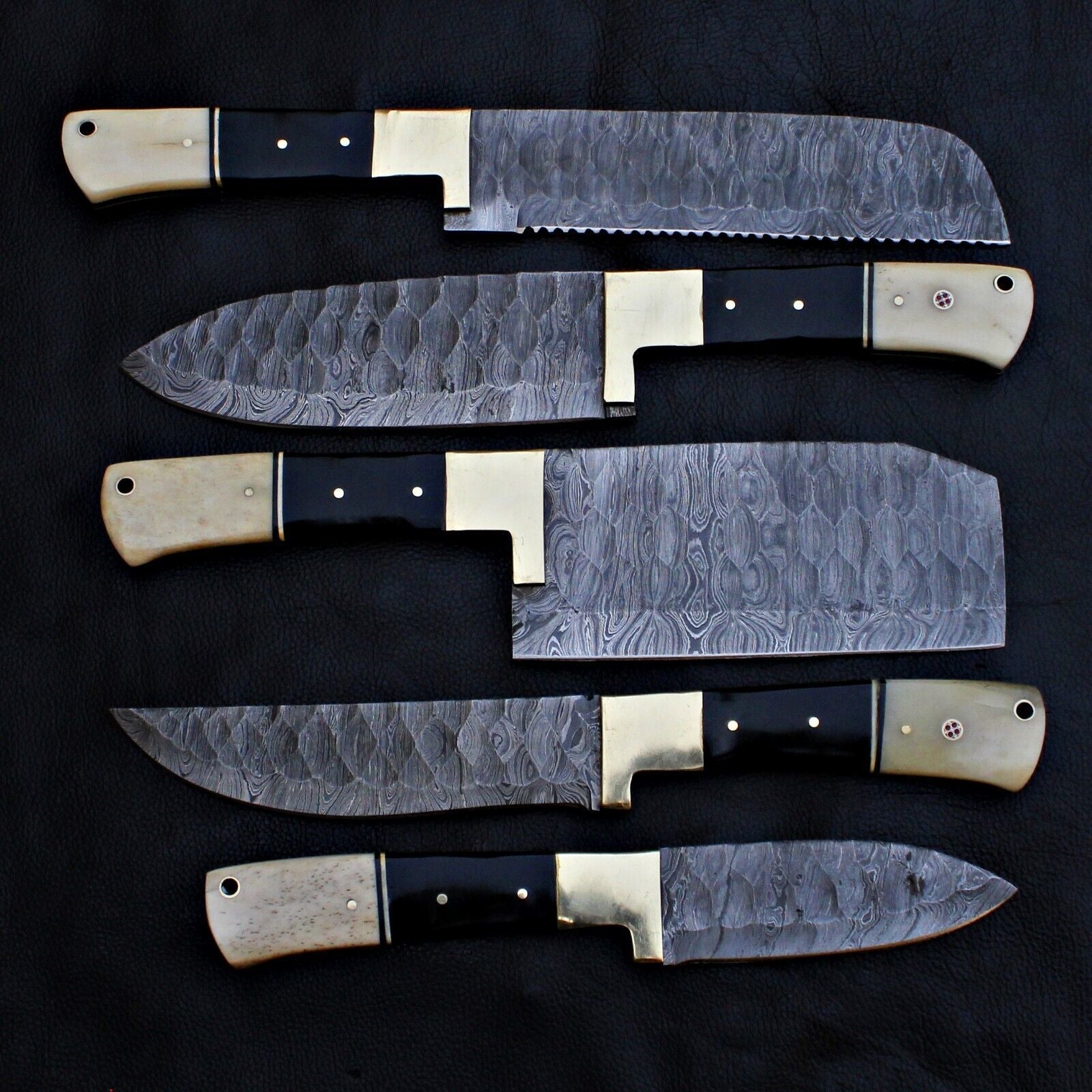 Top down layout of the 5 pc professional Damascus steel chef knife collection.