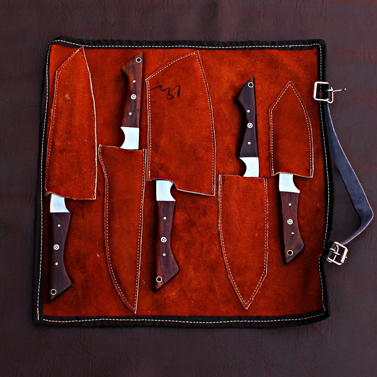 Top down layout of the 5 pc Damascus kitchen knife set, showing the consistent design and authentic forged steel textures.