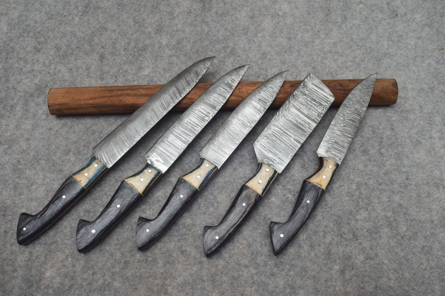 Complete 5 pc handmade Damascus kitchen knife collection, varying from 8 to 12 inches for versatile culinary tasks. 